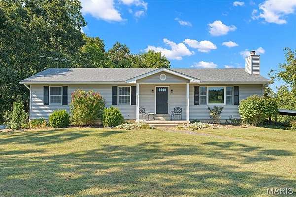 12.9 Acres of Land with Home for Sale in Leslie, Missouri