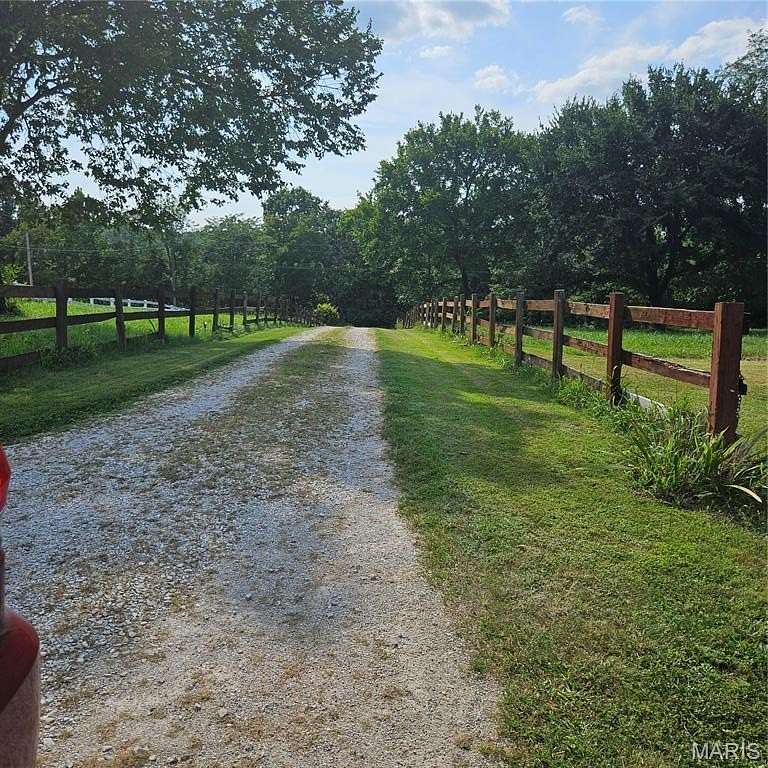 10 Acres of Land with Home for Auction in Villa Ridge, Missouri