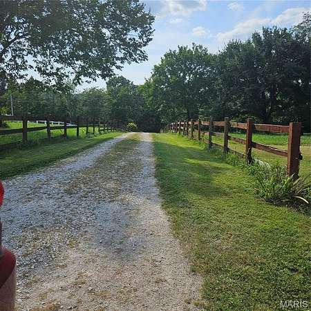 10 Acres of Land with Home for Auction in Villa Ridge, Missouri