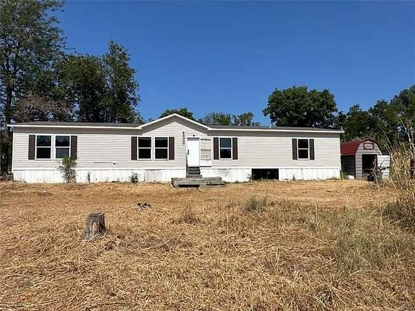 11.6 Acres of Land with Home for Sale in Locust Grove, Oklahoma