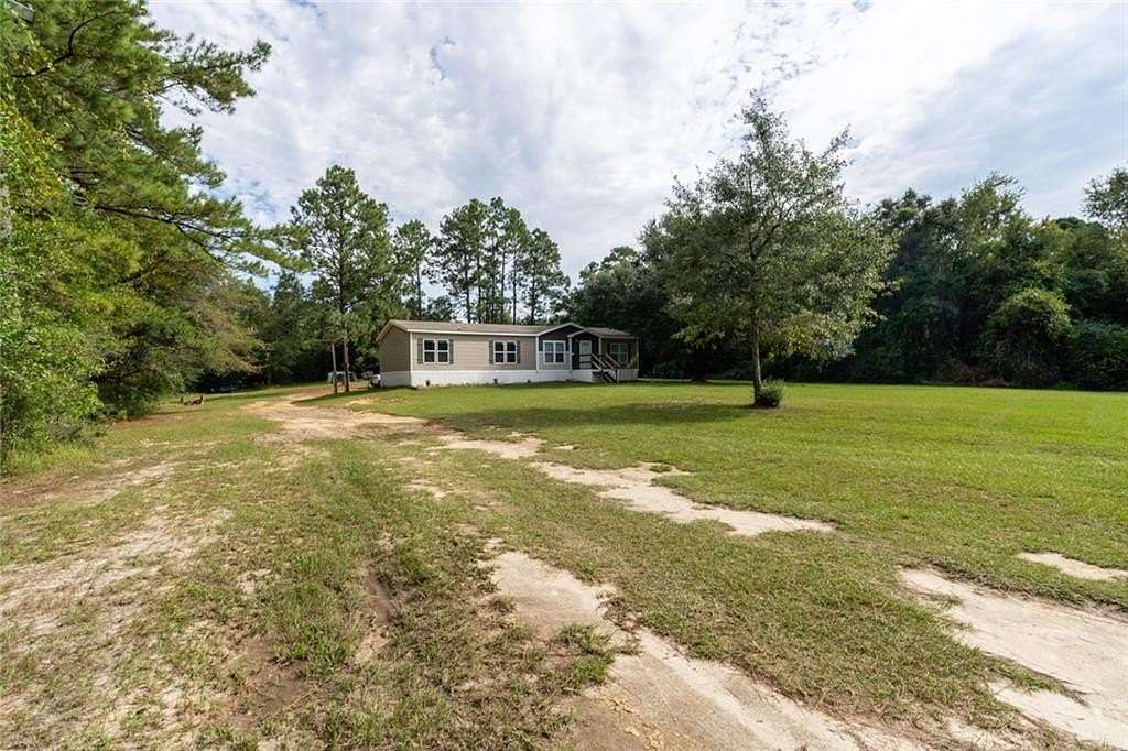3.7 Acres of Land with Home for Sale in Chunchula, Alabama