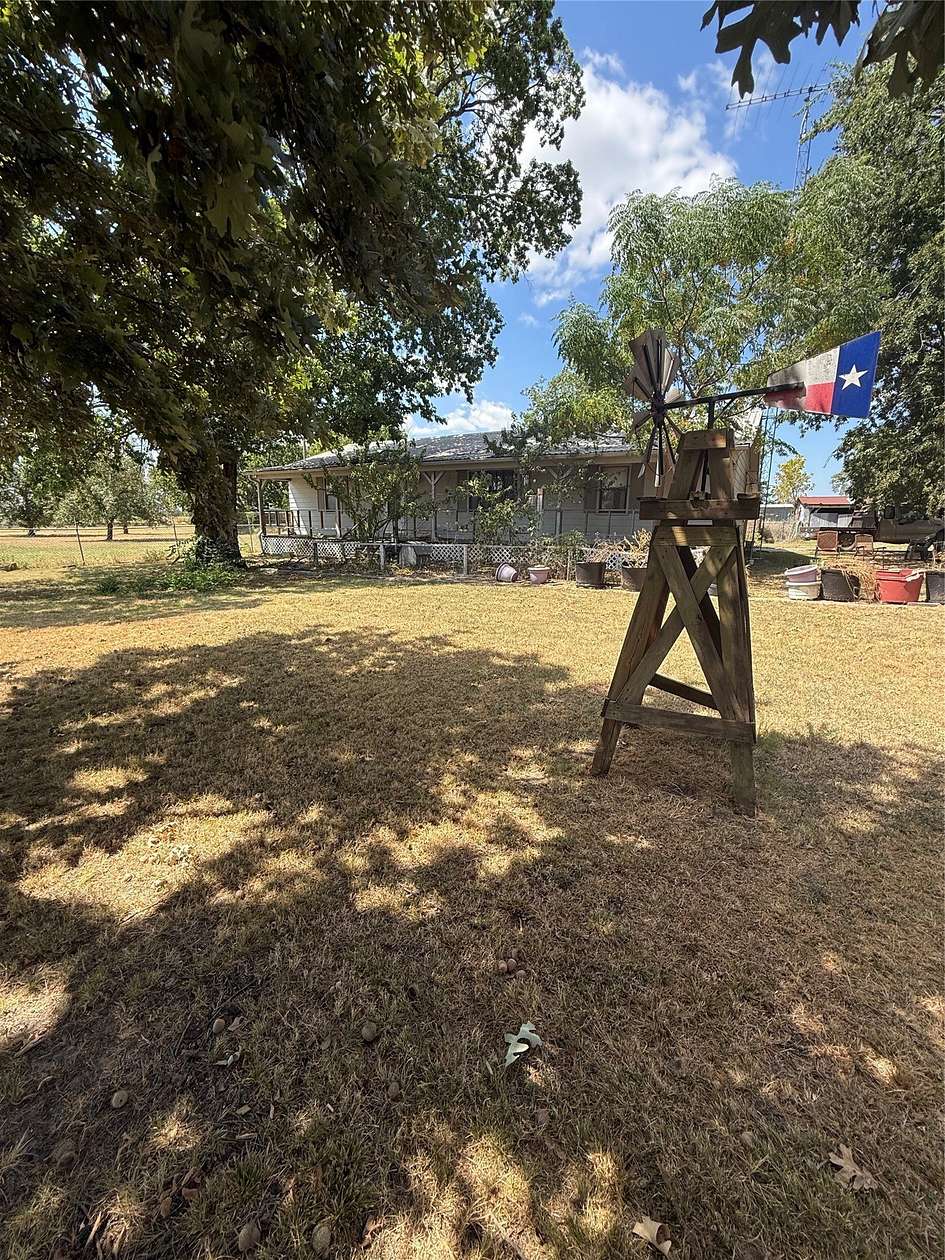 14.5 Acres of Land with Home for Sale in Honey Grove, Texas