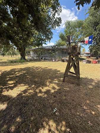 14.5 Acres of Land with Home for Sale in Honey Grove, Texas