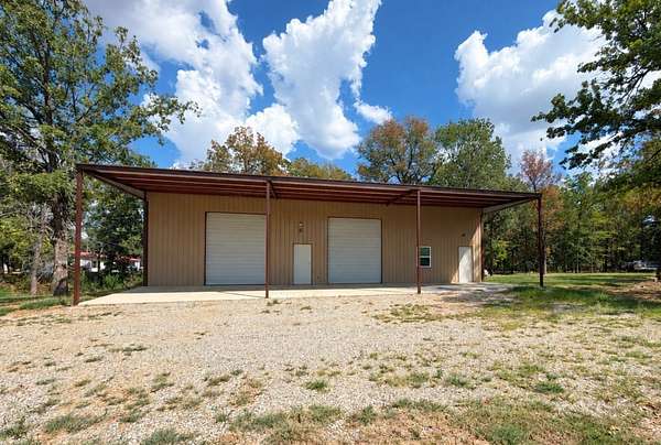 5.88 Acres of Land with Home for Sale in Powderly, Texas