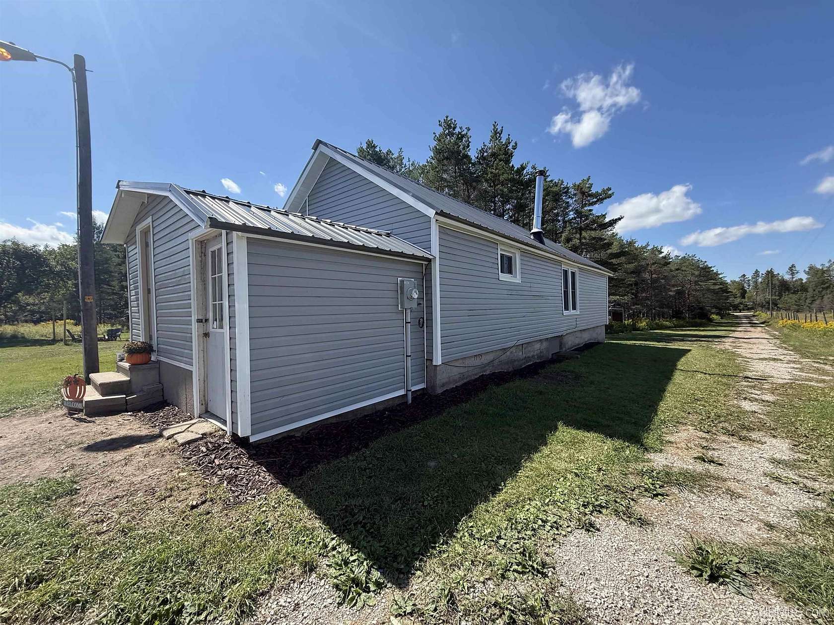 7.17 Acres of Land with Home for Sale in Perronville, Michigan