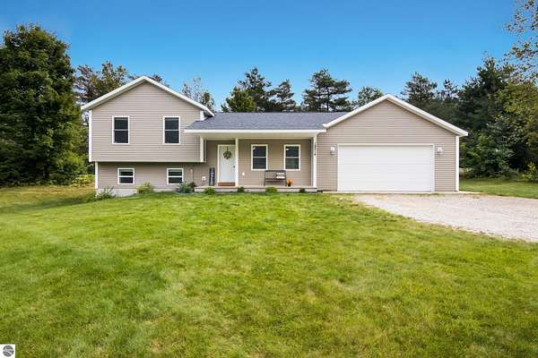 2.5 Acres of Land with Home for Sale in Interlochen, Michigan