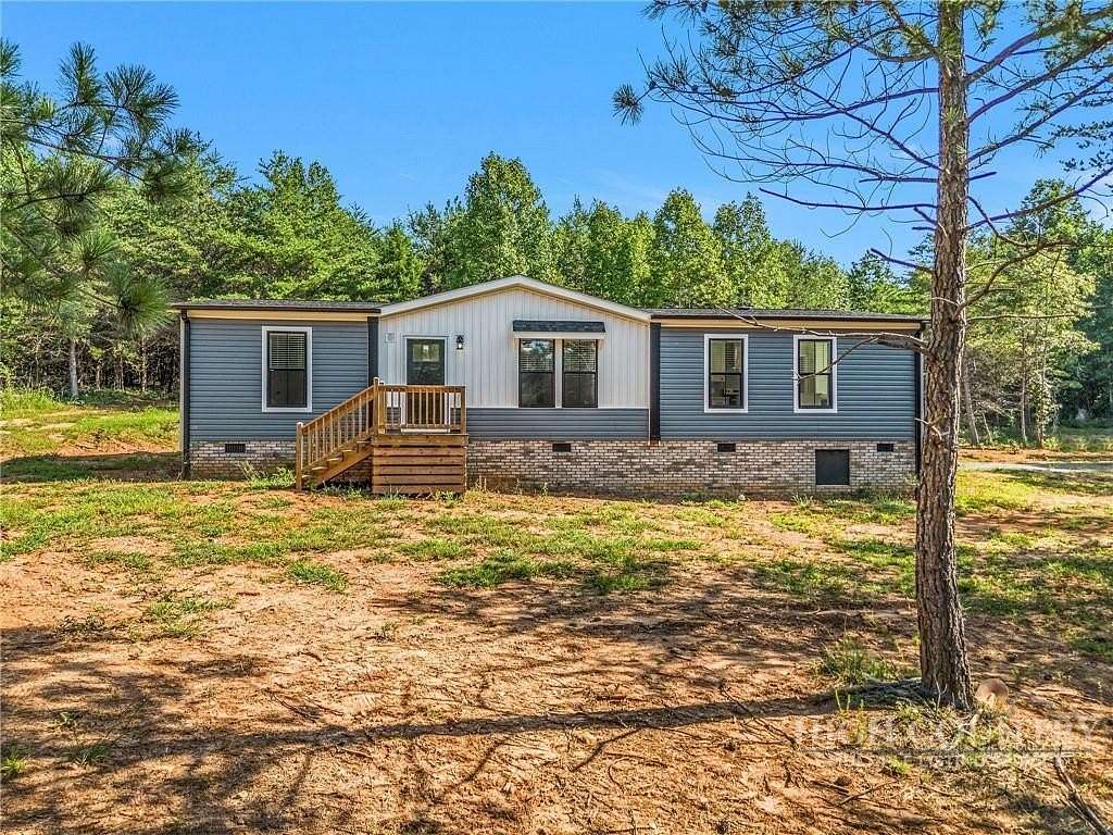 21 Acres of Land with Home for Sale in East Bend, North Carolina