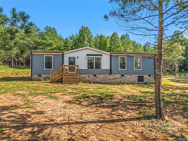 21 Acres of Land with Home for Sale in East Bend, North Carolina