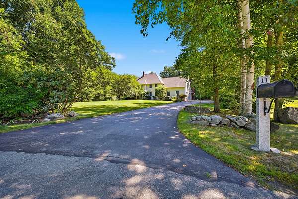 1.87 Acres of Land with Home for Sale in Salem, New Hampshire