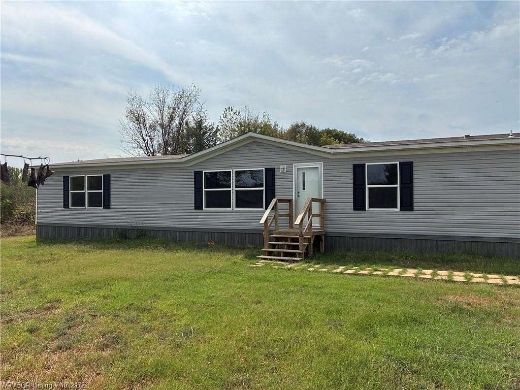 6.78 Acres of Land with Home for Sale in Ratcliff, Arkansas