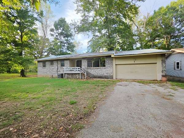 1.5 Acres of Land with Home for Sale in Hardy, Arkansas