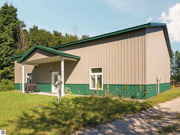 3.66 Acres of Land with Home for Sale in Williamsburg, Michigan