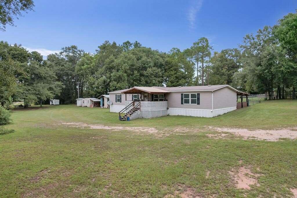 8.2 Acres of Land with Home for Sale in Pansey, Alabama