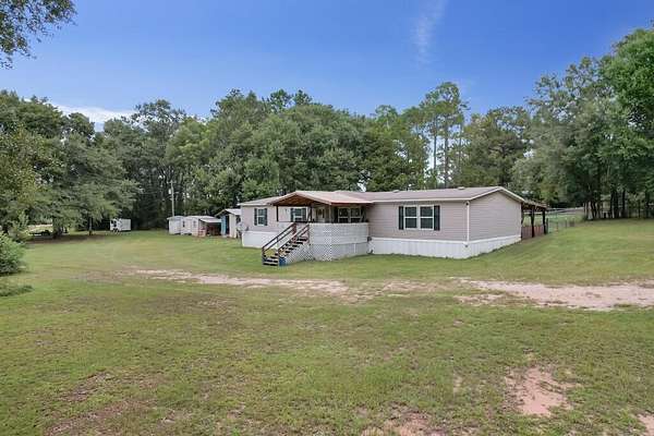 8.2 Acres of Land with Home for Sale in Pansey, Alabama