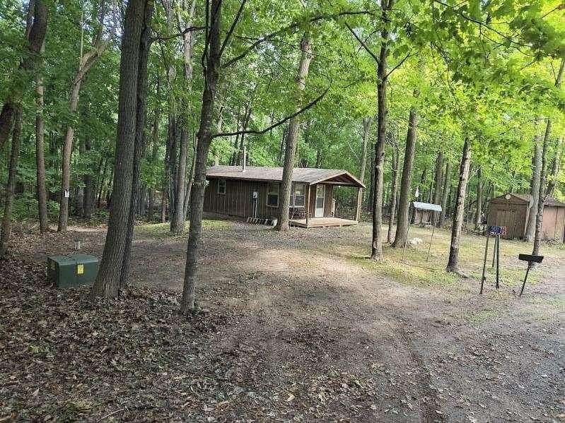 30.5 Acres of Recreational Land with Home for Sale in Grasston, Minnesota