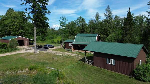 40 Acres of Recreational Land with Home for Sale in Thompsonville, Michigan