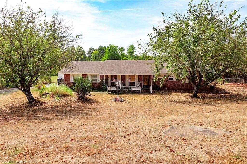 1.64 Acres of Land with Home for Sale in Muldrow, Oklahoma