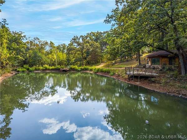 13 Acres of Land with Home for Sale in Linn Creek, Missouri