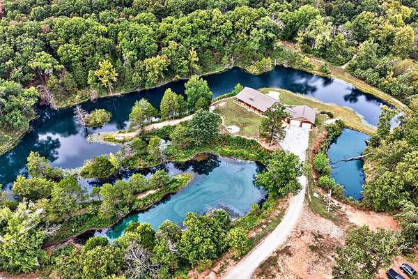 40 Acres of Recreational Land with Home for Sale in Deepwater, Missouri