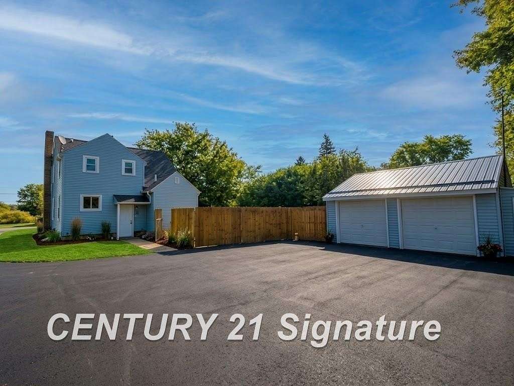 2 Acres of Land with Home for Sale in Burton, Michigan