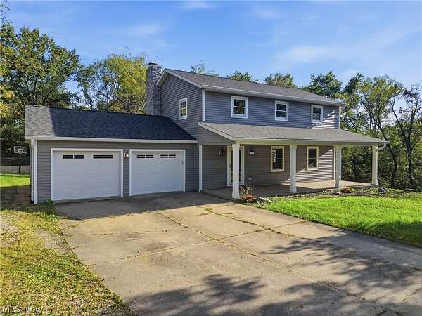 1.68 Acres of Land with Home for Sale in Zanesville, Ohio