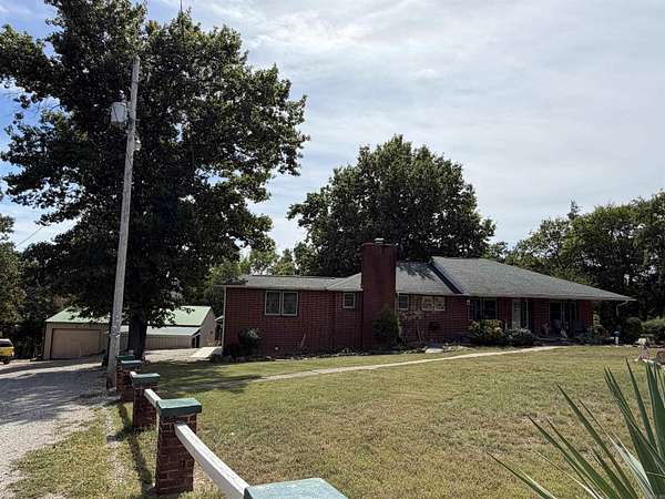 2.62 Acres of Land with Home for Sale in Flippin, Arkansas