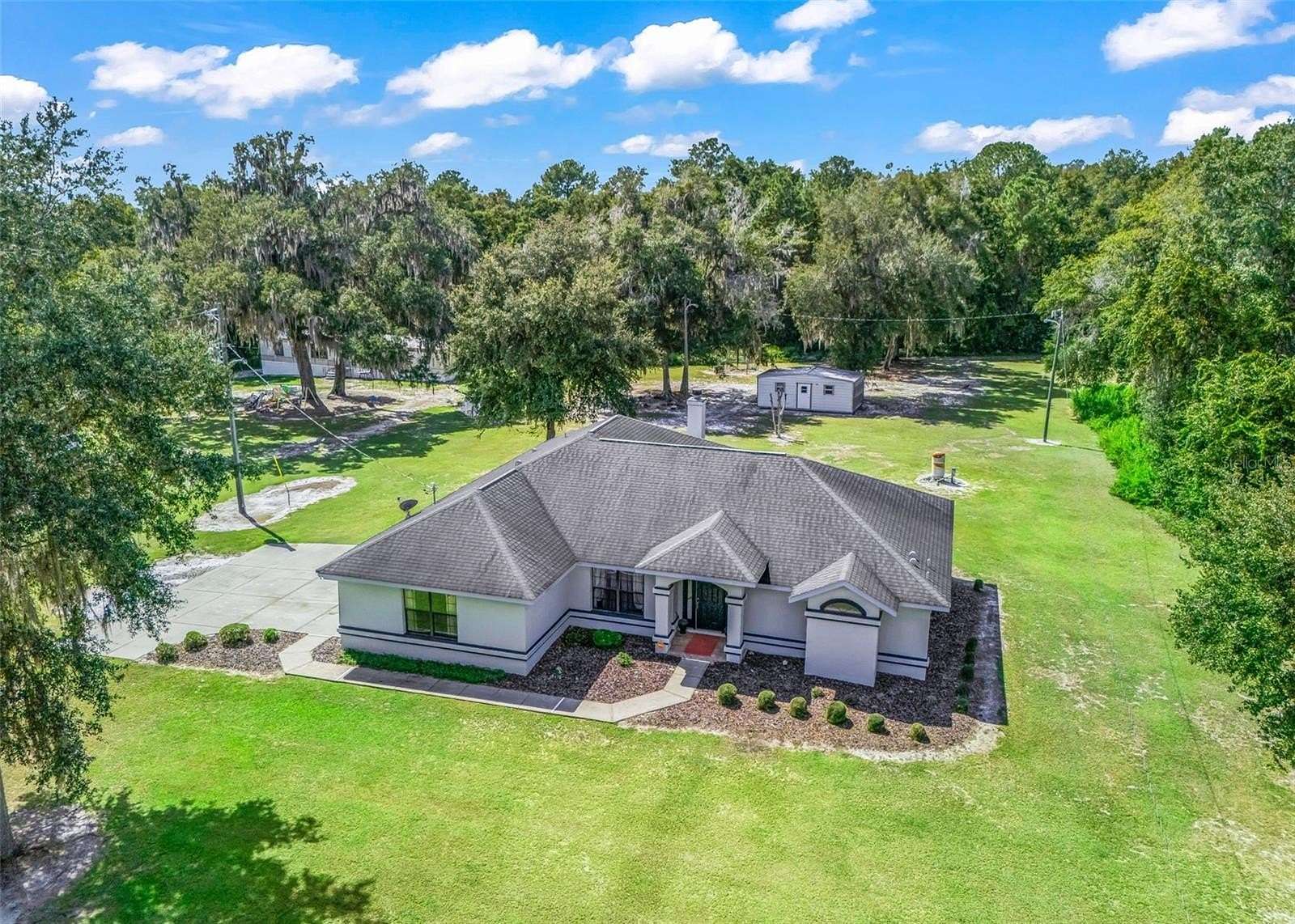2.37 Acres of Land with Home for Sale in Reddick, Florida