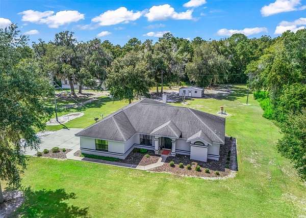 2.37 Acres of Land with Home for Sale in Reddick, Florida