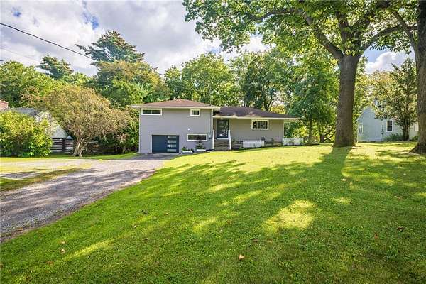 3 Acres of Land with Home for Sale in Fairport, New York