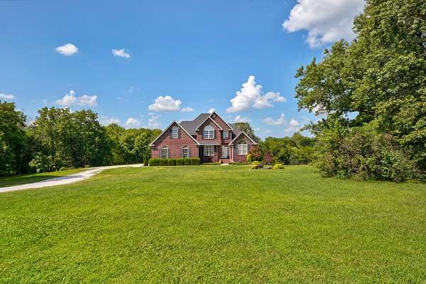 10 Acres of Land with Home for Sale in Republic, Missouri