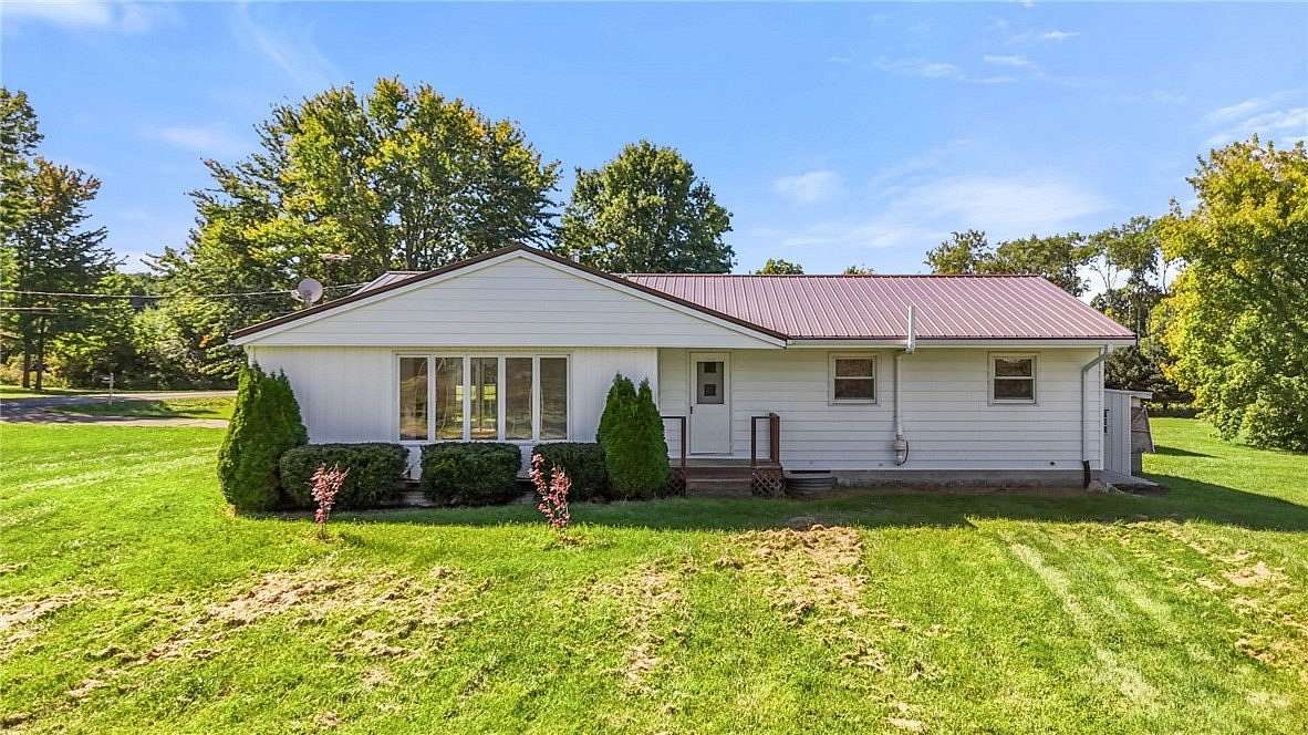 7.33 Acres of Land with Home for Auction in Rock Stream, New York