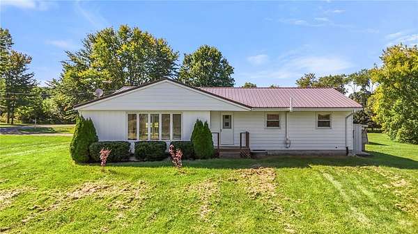 7.33 Acres of Land with Home for Auction in Rock Stream, New York