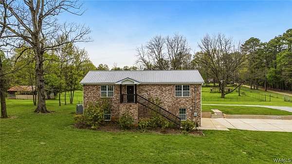 8.8 Acres of Land with Home for Sale in McCalla, Alabama