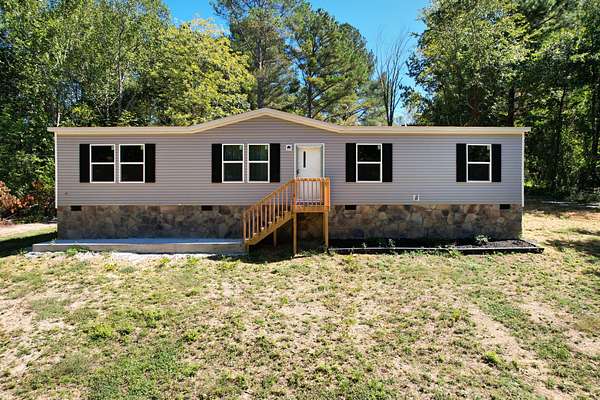 1.79 Acres of Land with Home for Sale in Spring City, Tennessee