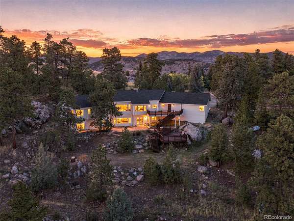 14.4 Acres of Land with Home for Sale in Evergreen, Colorado