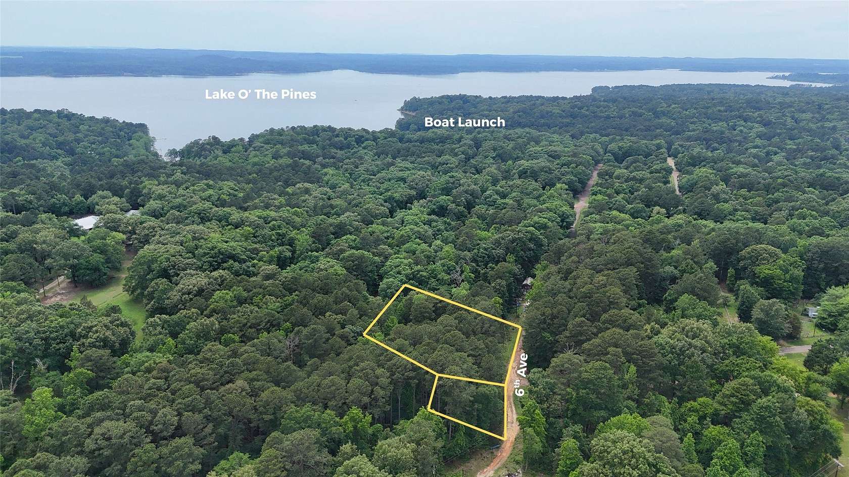 0.86 Acres of Residential Land for Sale in Avinger, Texas