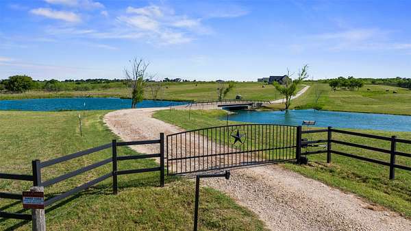 27.9 Acres of Agricultural Land with Home for Sale in Rogers, Texas