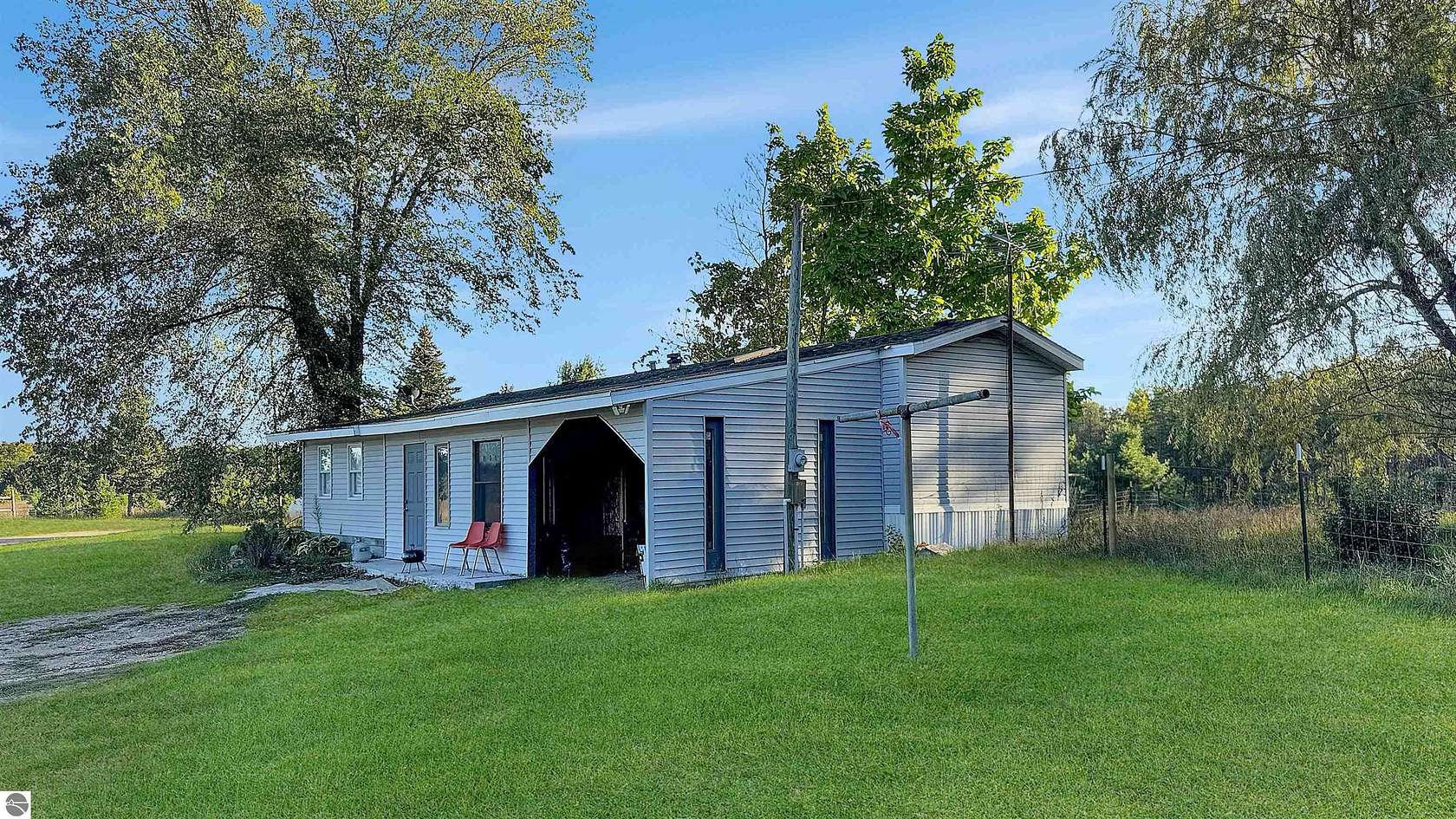 5.67 Acres of Land with Home for Sale in Boon, Michigan