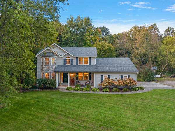 8 Acres of Land with Home for Sale in Hartland, Michigan