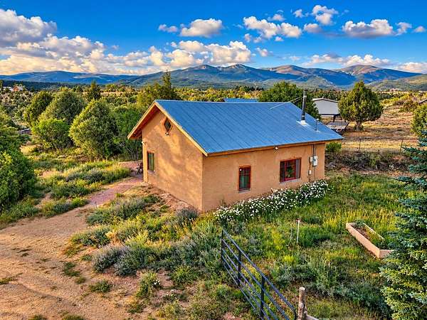 6.73 Acres of Land with Home for Sale in Peñasco, New Mexico