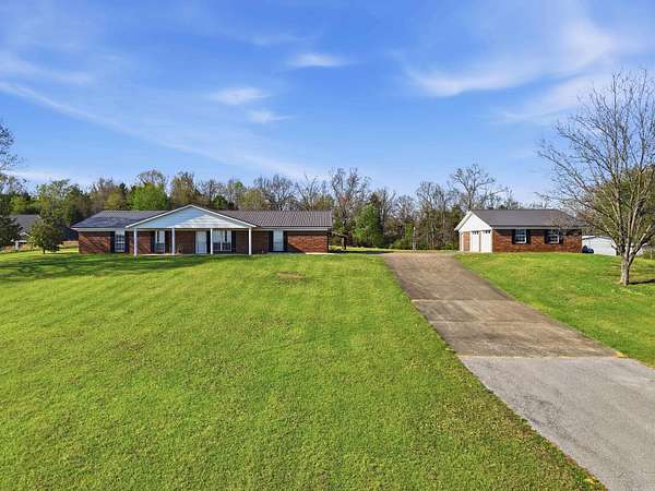 7.5 Acres of Land with Home for Sale in Greenbrier, Arkansas