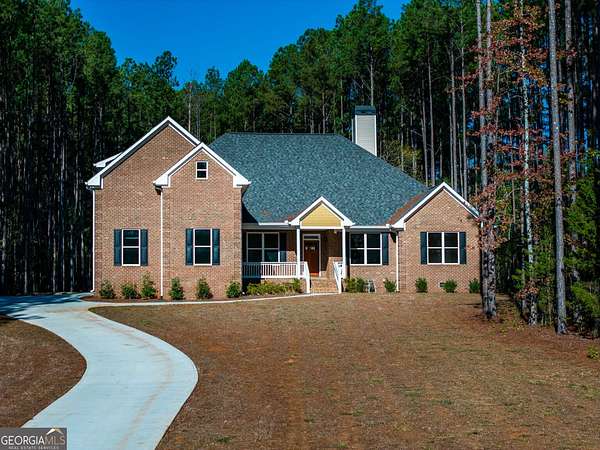 2.26 Acres of Land with Home for Sale in Mansfield, Georgia