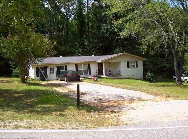 1.74 Acres of Land with Home for Auction in Winfield, Alabama