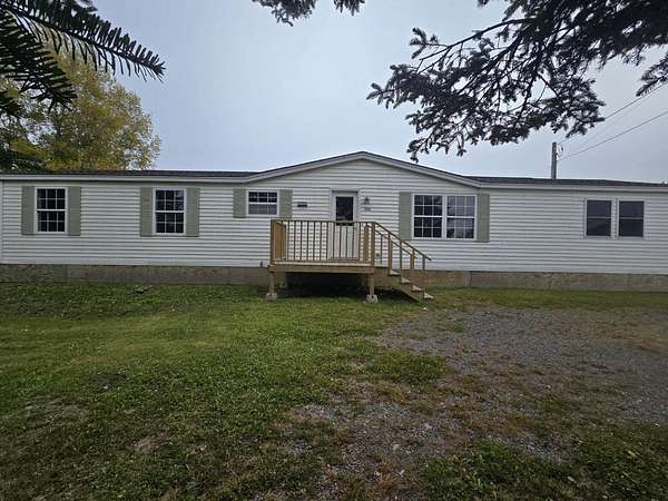 12 Acres of Land with Home for Sale in Caribou, Maine