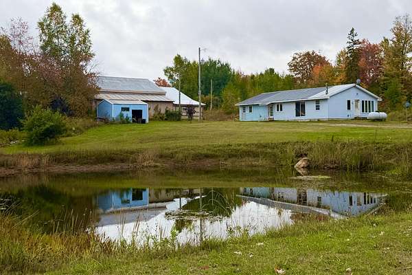 6.87 Acres of Land with Home for Sale in McMillan, Michigan