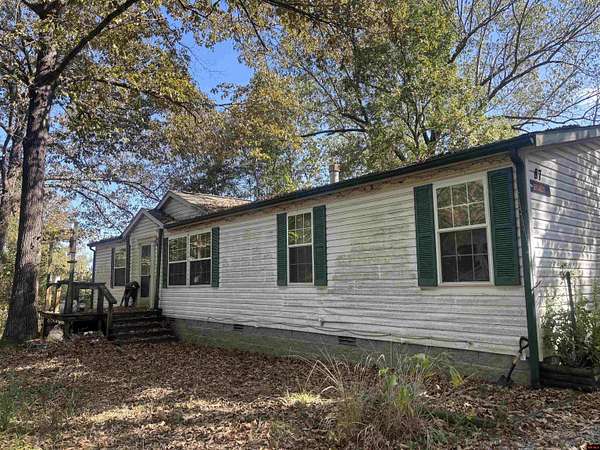 5 Acres of Land with Home for Sale in Flippin, Arkansas