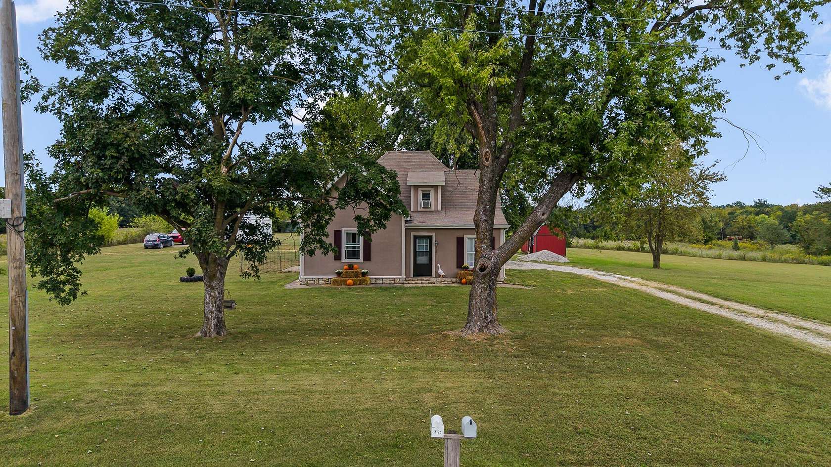 5.76 Acres of Land with Home for Sale in New Bloomfield, Missouri