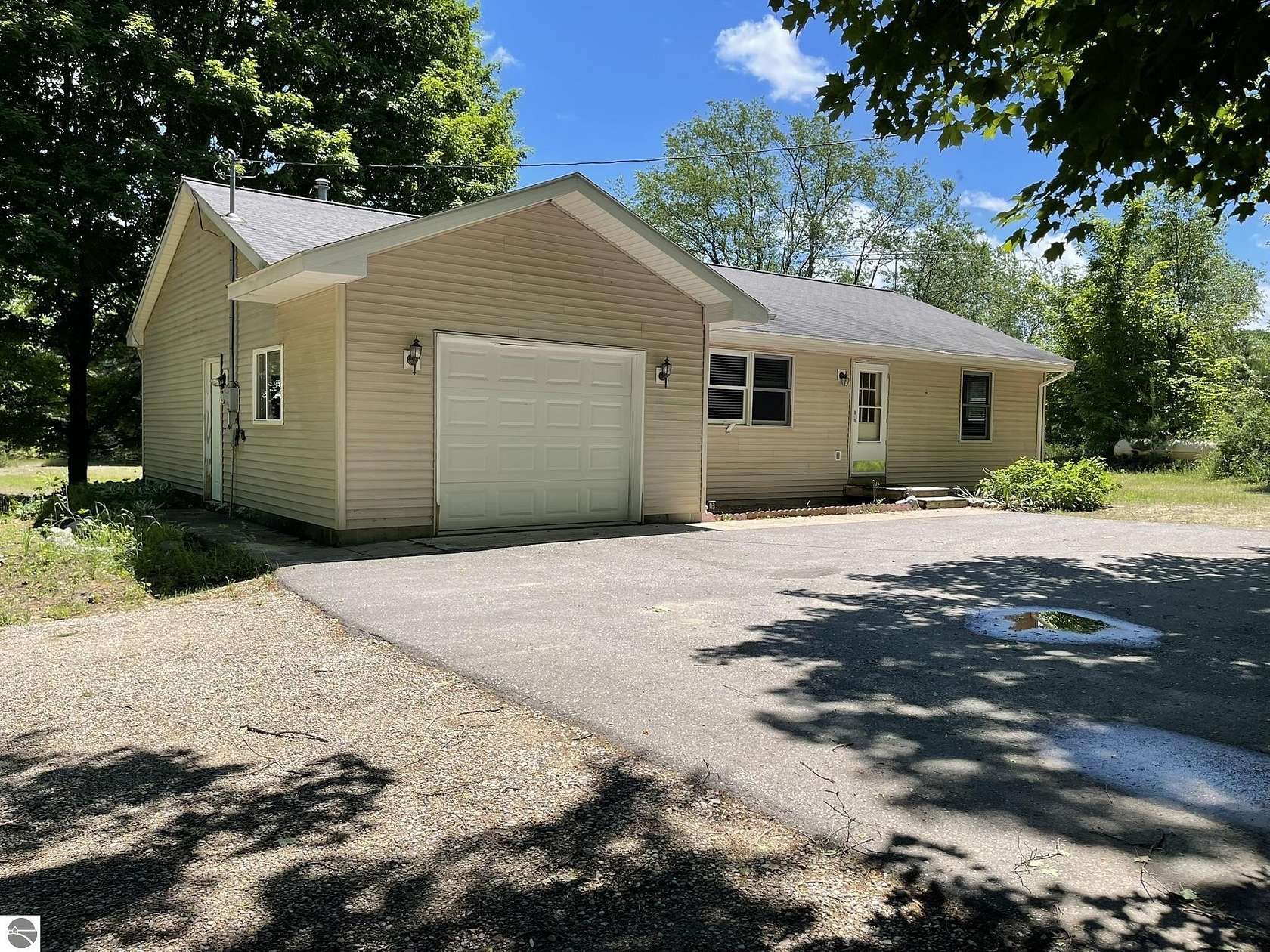 5 Acres of Land with Home for Sale in Mancelona, Michigan