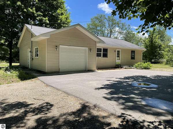 5 Acres of Land with Home for Sale in Mancelona, Michigan