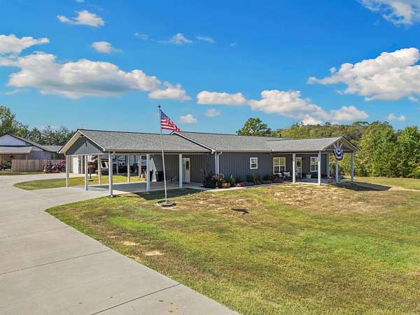 1.63 Acres of Land with Home for Sale in Quitman, Arkansas